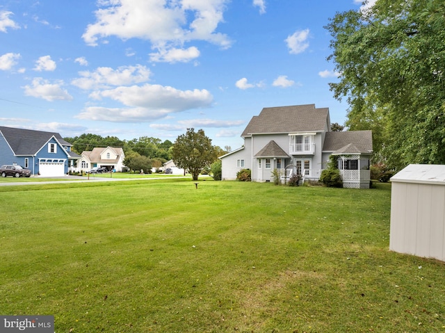 view of yard featuring a garage