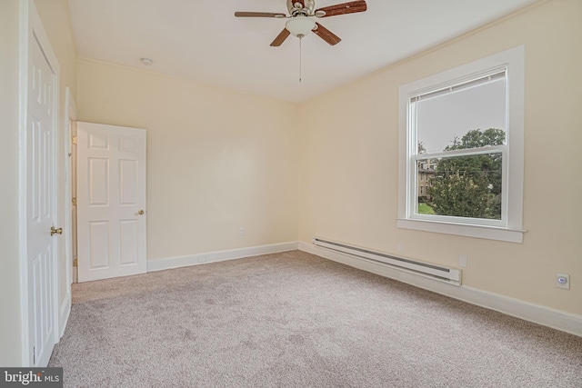 empty room featuring ceiling fan, carpet, and a baseboard heating unit