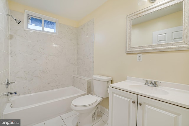 full bathroom with tile patterned floors, toilet, vanity, and tiled shower / bath combo