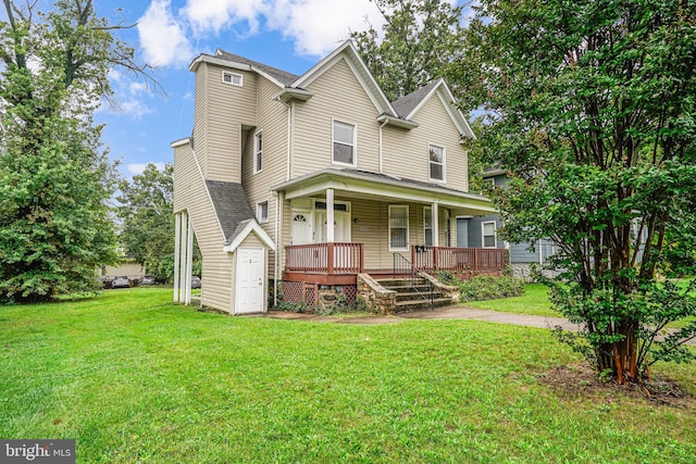 view of front facade featuring a front lawn and a porch