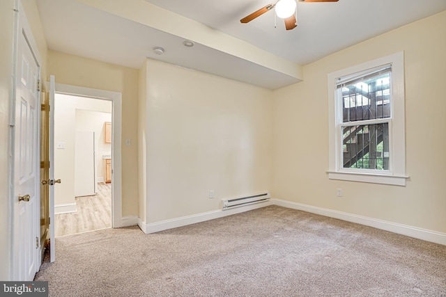 unfurnished room featuring light carpet, a baseboard radiator, and ceiling fan