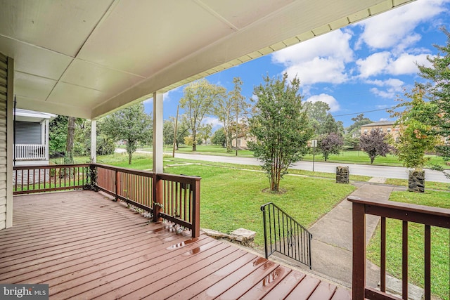 deck featuring a lawn