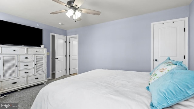 carpeted bedroom with ceiling fan