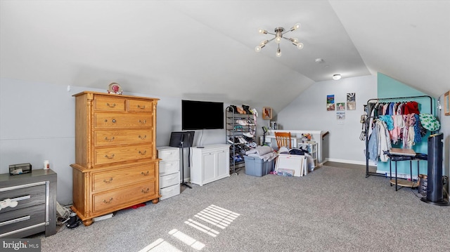 interior space featuring vaulted ceiling and carpet flooring