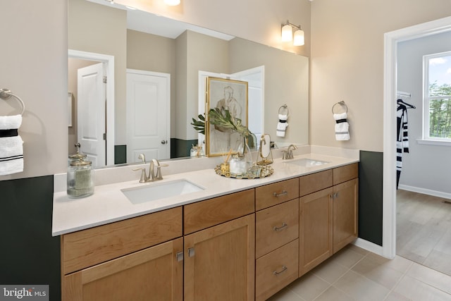 bathroom with vanity and tile patterned floors