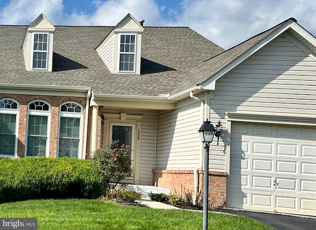 view of exterior entry with a garage