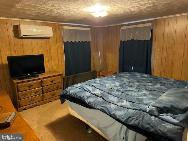 bedroom with wood walls, carpet floors, and a wall mounted air conditioner