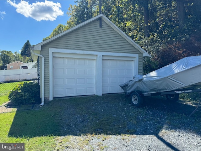 garage with a yard