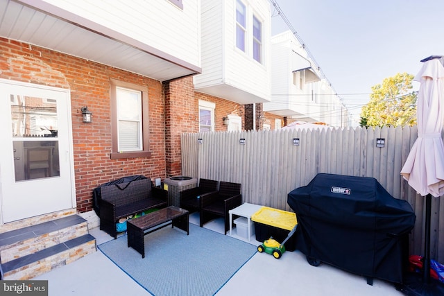 view of patio / terrace featuring area for grilling and an outdoor hangout area