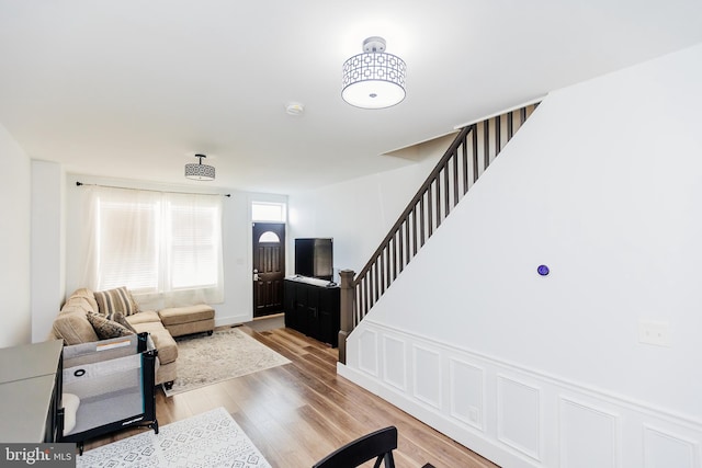 living room with light hardwood / wood-style floors