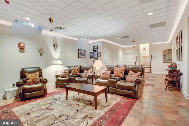 tiled living room with ornamental molding