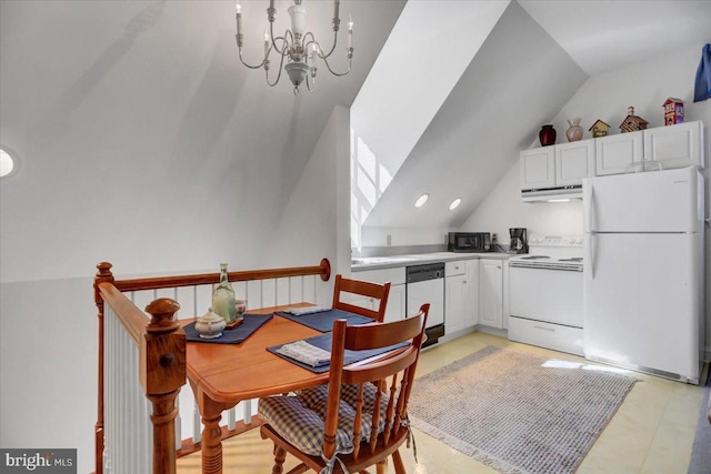 kitchen featuring vaulted ceiling, white cabinets, a chandelier, and white appliances