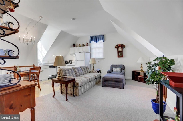 carpeted living room with a chandelier and vaulted ceiling