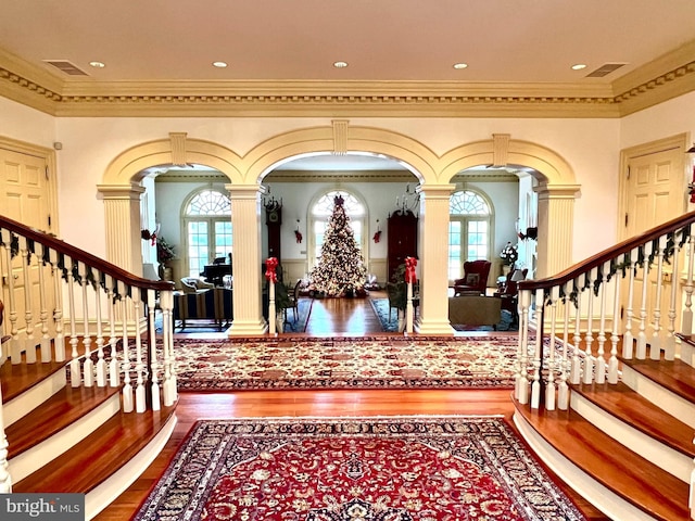 373 Craig Rd, Greencastle, PA 17225 - entrance foyer featuring ornate columns, ornamental molding, wood finished floors, and stairway