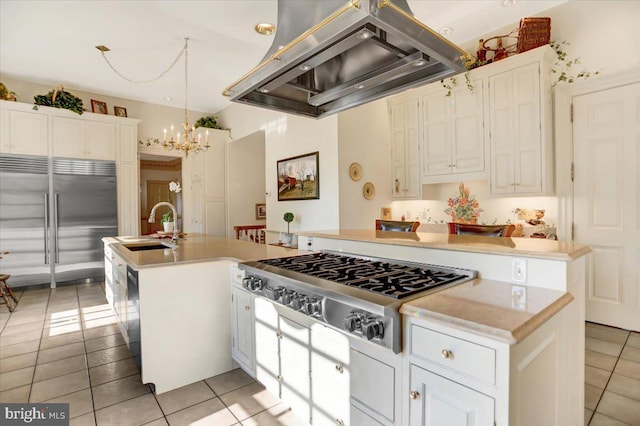 kitchen featuring island range hood, stainless steel appliances, sink, a center island with sink, and white cabinetry