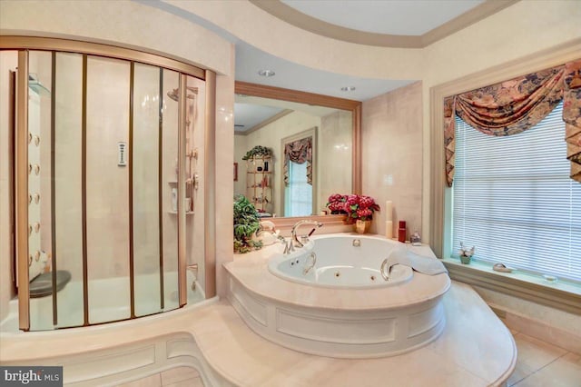 bathroom featuring tile patterned floors, crown molding, and shower with separate bathtub