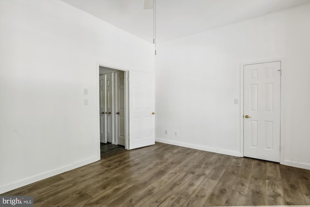 spare room featuring dark hardwood / wood-style floors