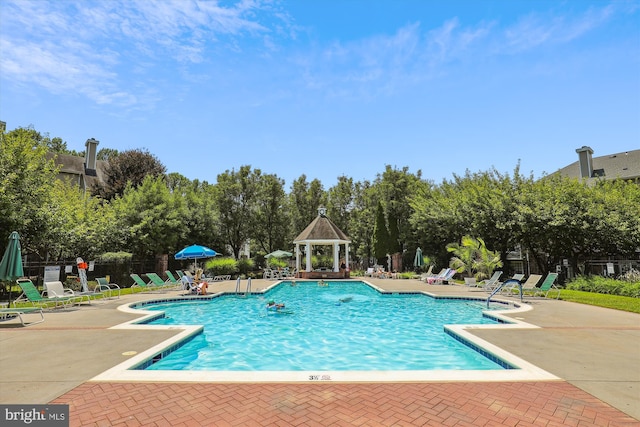 view of pool featuring a patio area and a gazebo