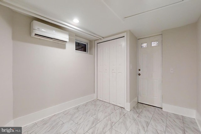 interior space featuring an AC wall unit