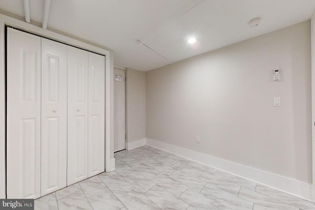 unfurnished bedroom featuring a closet