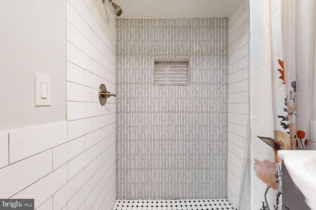 bathroom with a shower with curtain