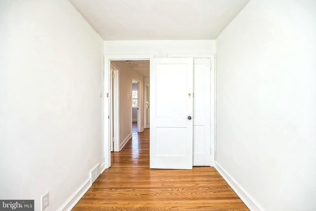 interior space featuring visible vents, baseboards, and light wood-style floors