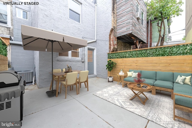 view of patio with outdoor lounge area and central AC unit