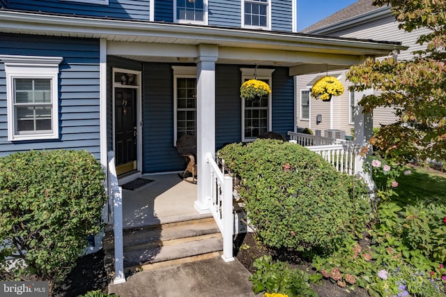 entrance to property with covered porch