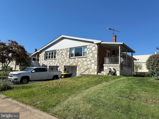 view of home's exterior featuring a yard