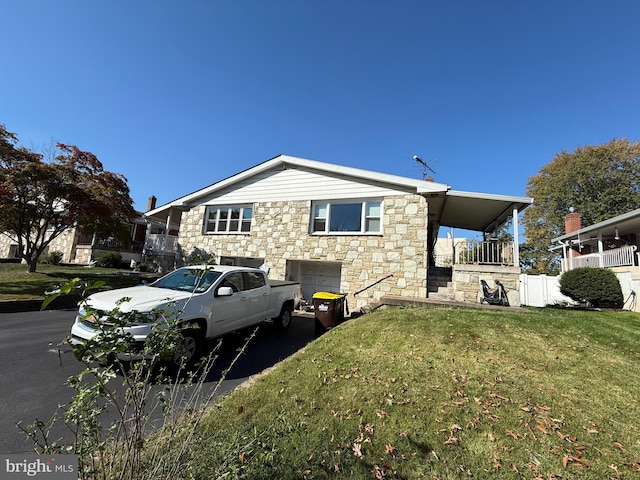 view of property exterior with a lawn