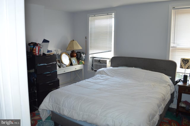 bedroom featuring cooling unit