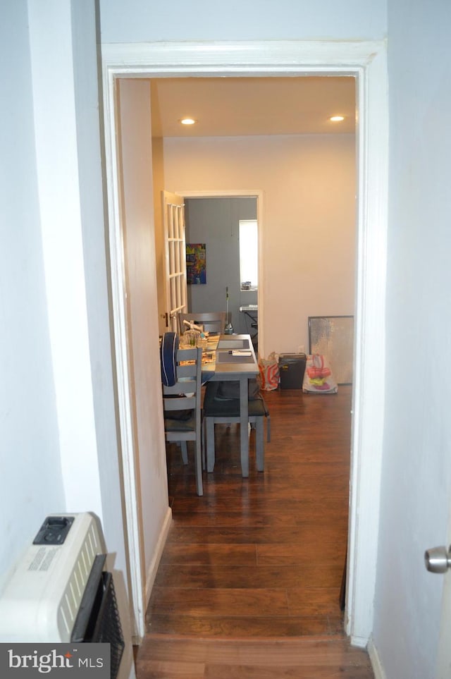 hall featuring dark wood-type flooring