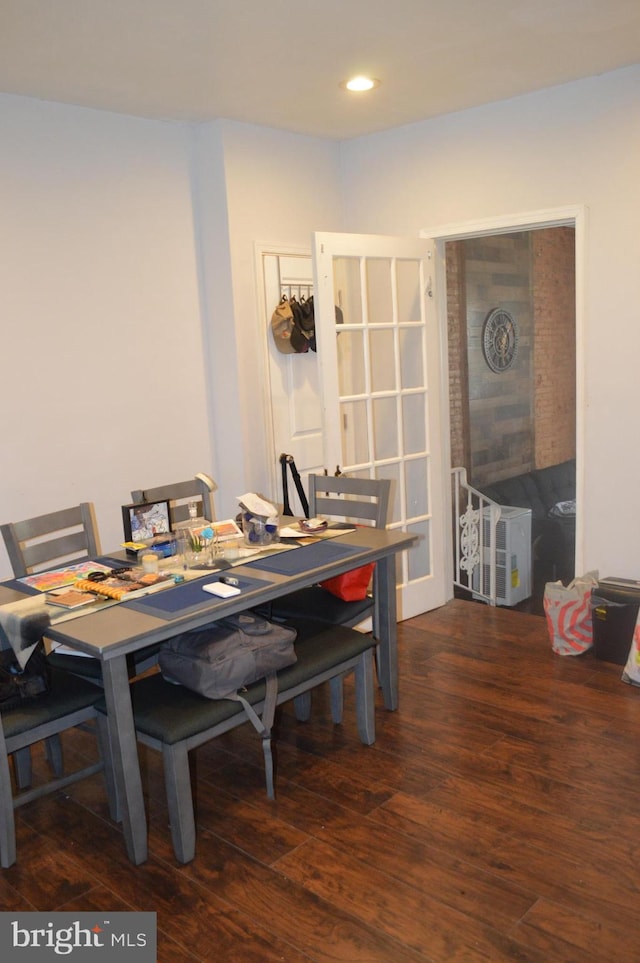 dining room with dark hardwood / wood-style floors