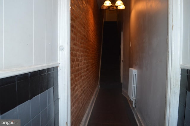 hallway featuring radiator heating unit