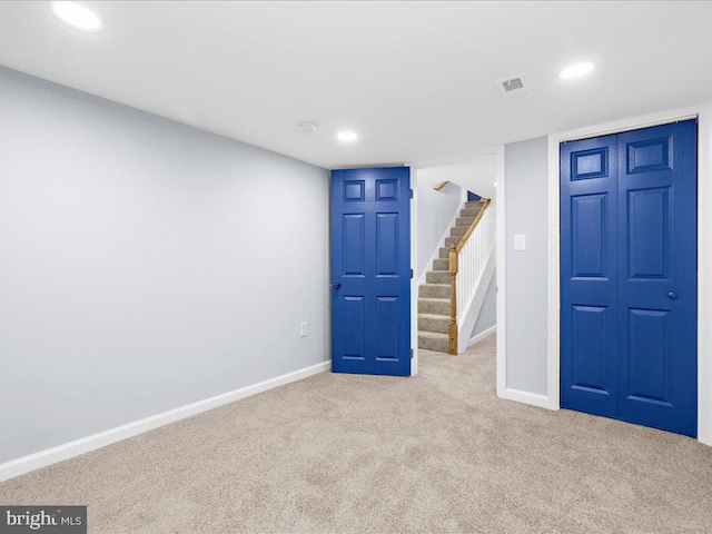 basement with light carpet