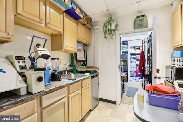 3536 Minnesota Ave SE, Washington, DC 20019 - kitchen with stainless steel appliances, light brown cabinetry, and a drop ceiling