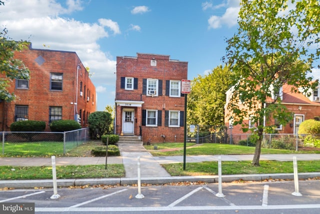 3536 Minnesota Ave SE, Washington, DC 20019 - view of property with brick siding and uncovered parking