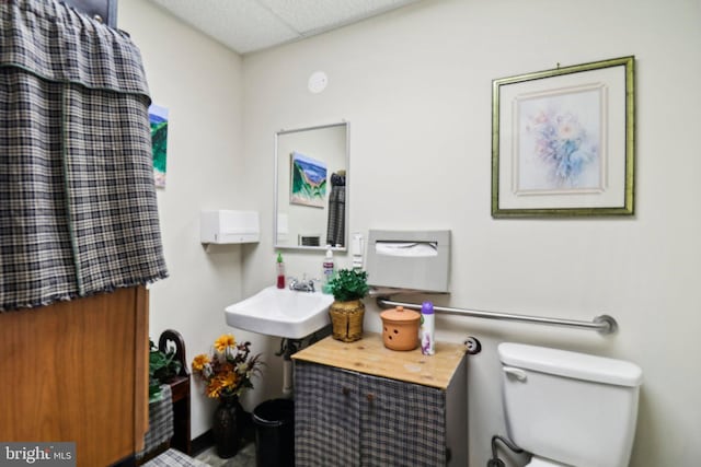 3536 Minnesota Ave SE, Washington, DC 20019 - bathroom featuring toilet and a drop ceiling