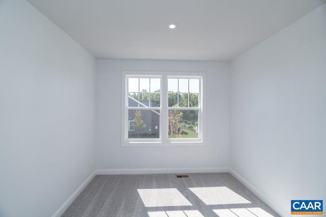 view of carpeted spare room