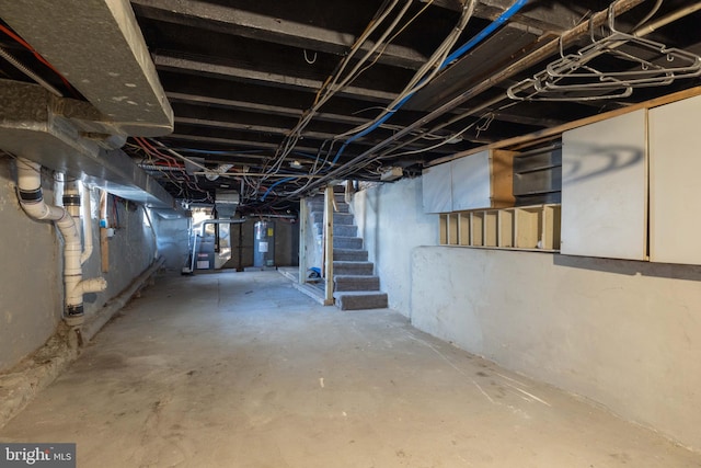 basement featuring electric water heater