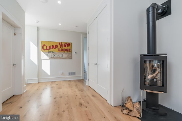 corridor featuring light hardwood / wood-style floors