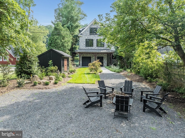 view of patio / terrace with a fire pit