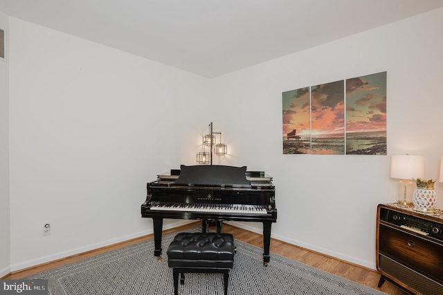 misc room with wood-type flooring