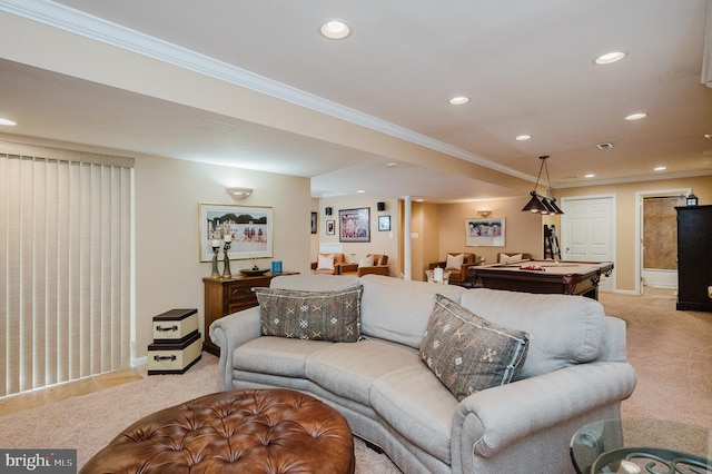 living room with light colored carpet, ornamental molding, and pool table