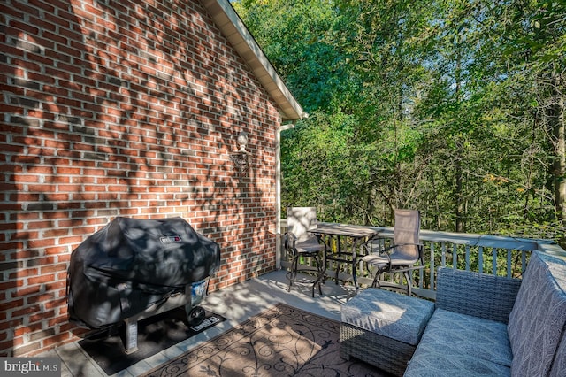 wooden terrace with grilling area