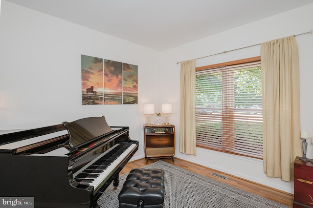 misc room with hardwood / wood-style flooring