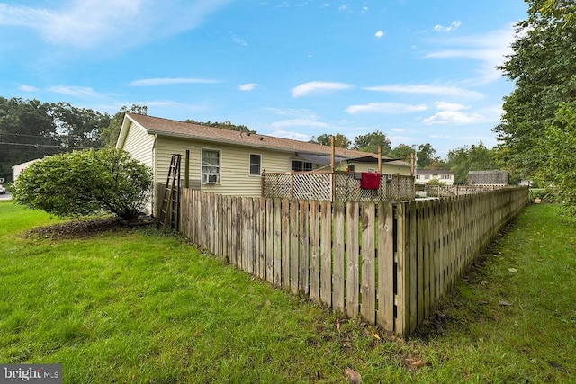 view of property exterior with a lawn