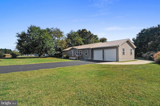 ranch-style home with a garage and a front yard