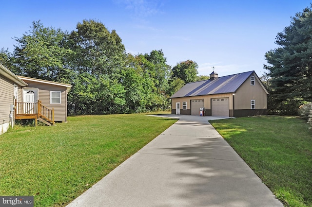 view of yard with a garage