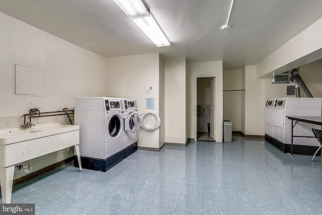 washroom with separate washer and dryer